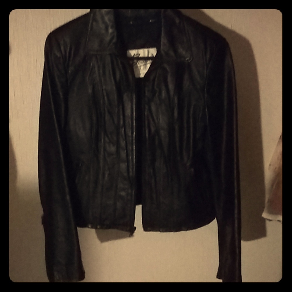 A leather jacket with a zipper lining.
